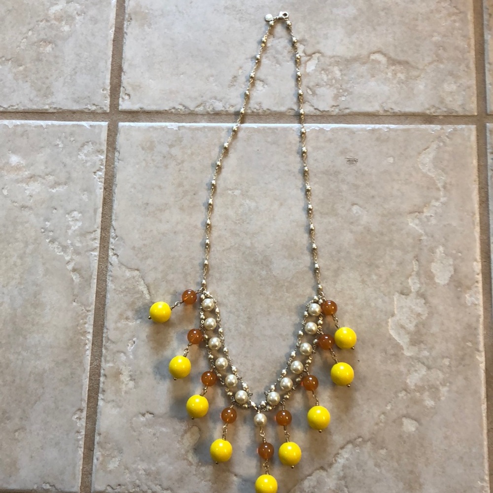 Long yellow beaded necklace